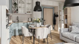 Kuchnia z jadalnią z okrągłym stołem i błękitną zabudową w realizacji Rogalskiego w Warszawie