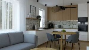 Salon z kuchnią z szarą sofą, okrągłym stołem jadalniany i czarną lampą Vertigo — realizacja Tulipanowa, Warszawa